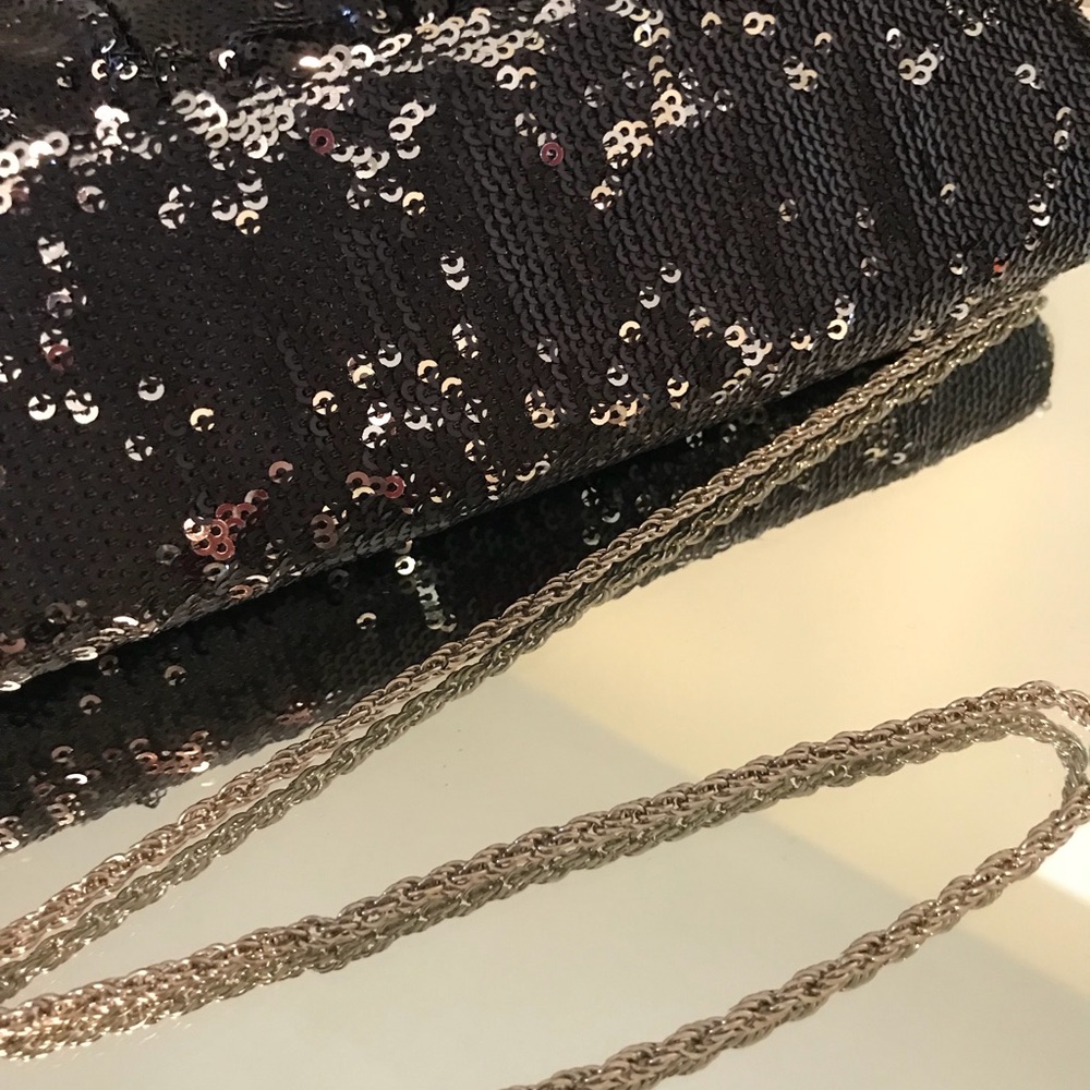 WHBM black sequin clutch.